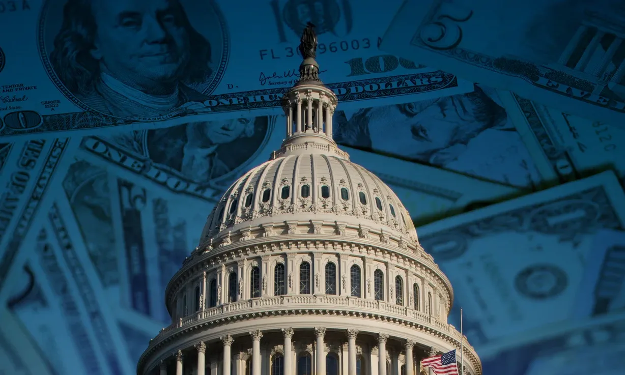 us-capital-money-crop Photo of US Capital on top of a pile of money